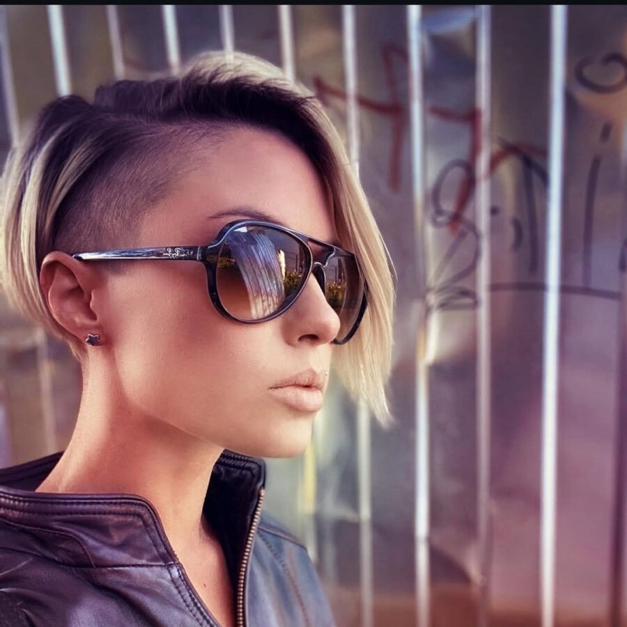 Stylish undercut with sleek blonde waves