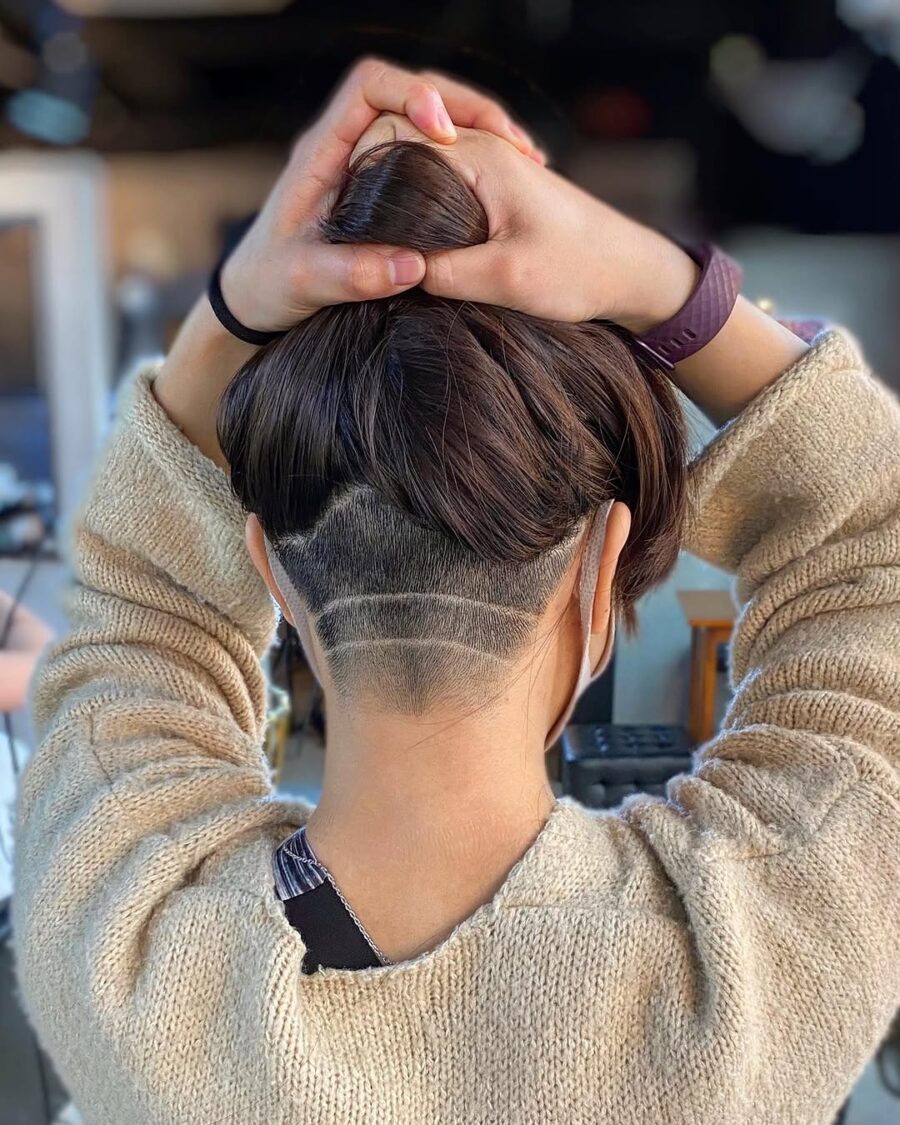 Stylish undereye hairstyle with bold designs