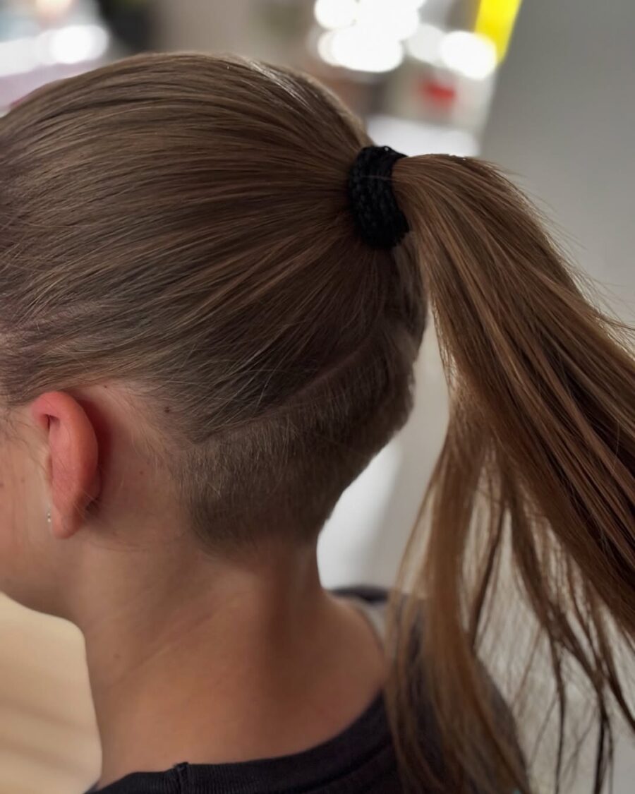Chic, modern undercut with sleek ponytail