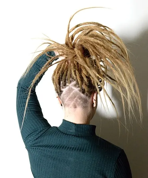 Elevated style with locs and undercut fusion