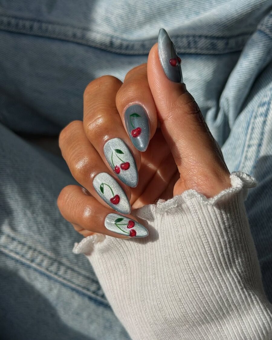 Chic velvet nails adorned with cherry accents