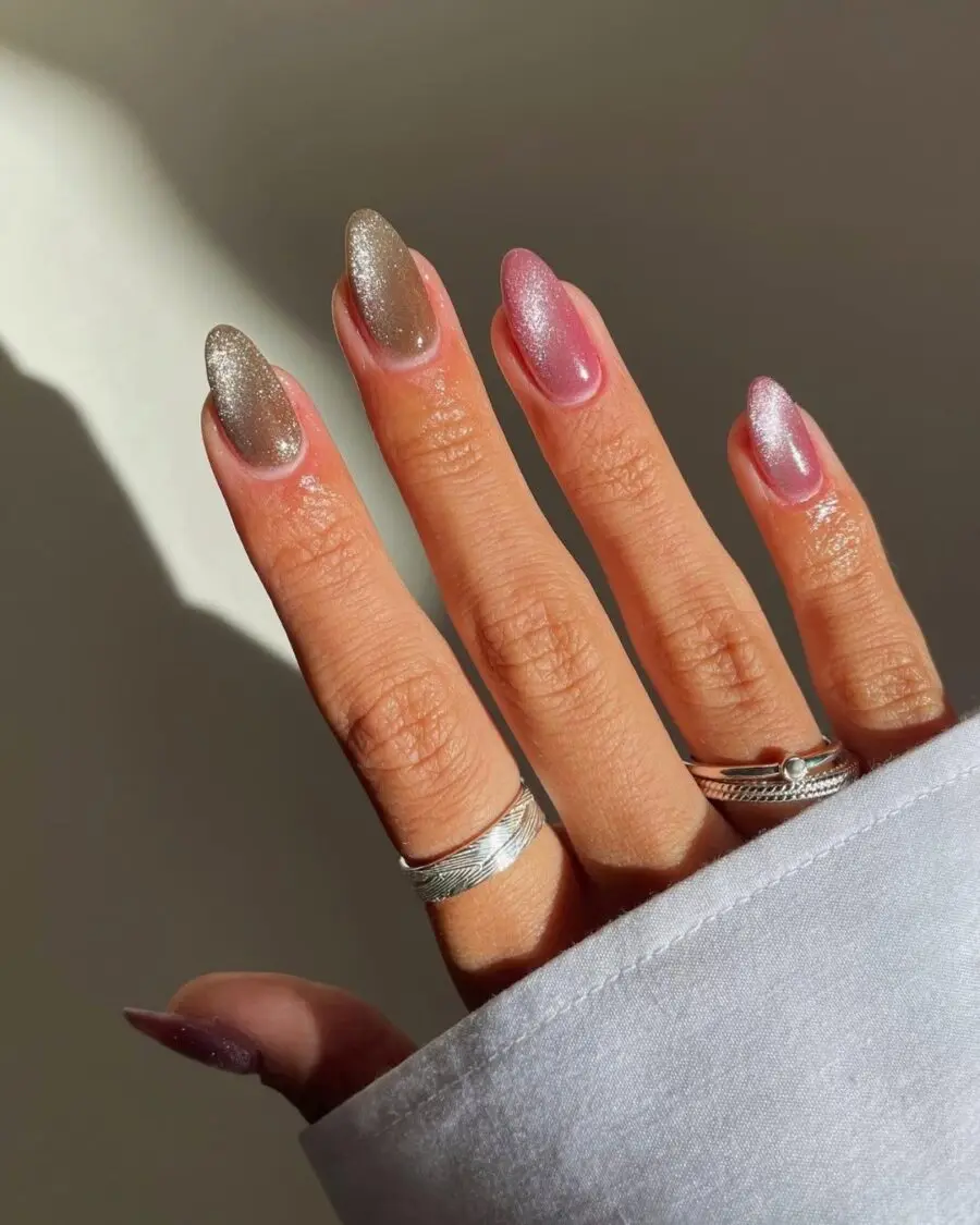 Elegant hands showcasing shimmering velvet nails