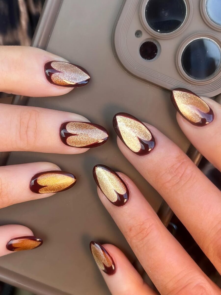 Gorgeous burgundy and gold velvet nail art