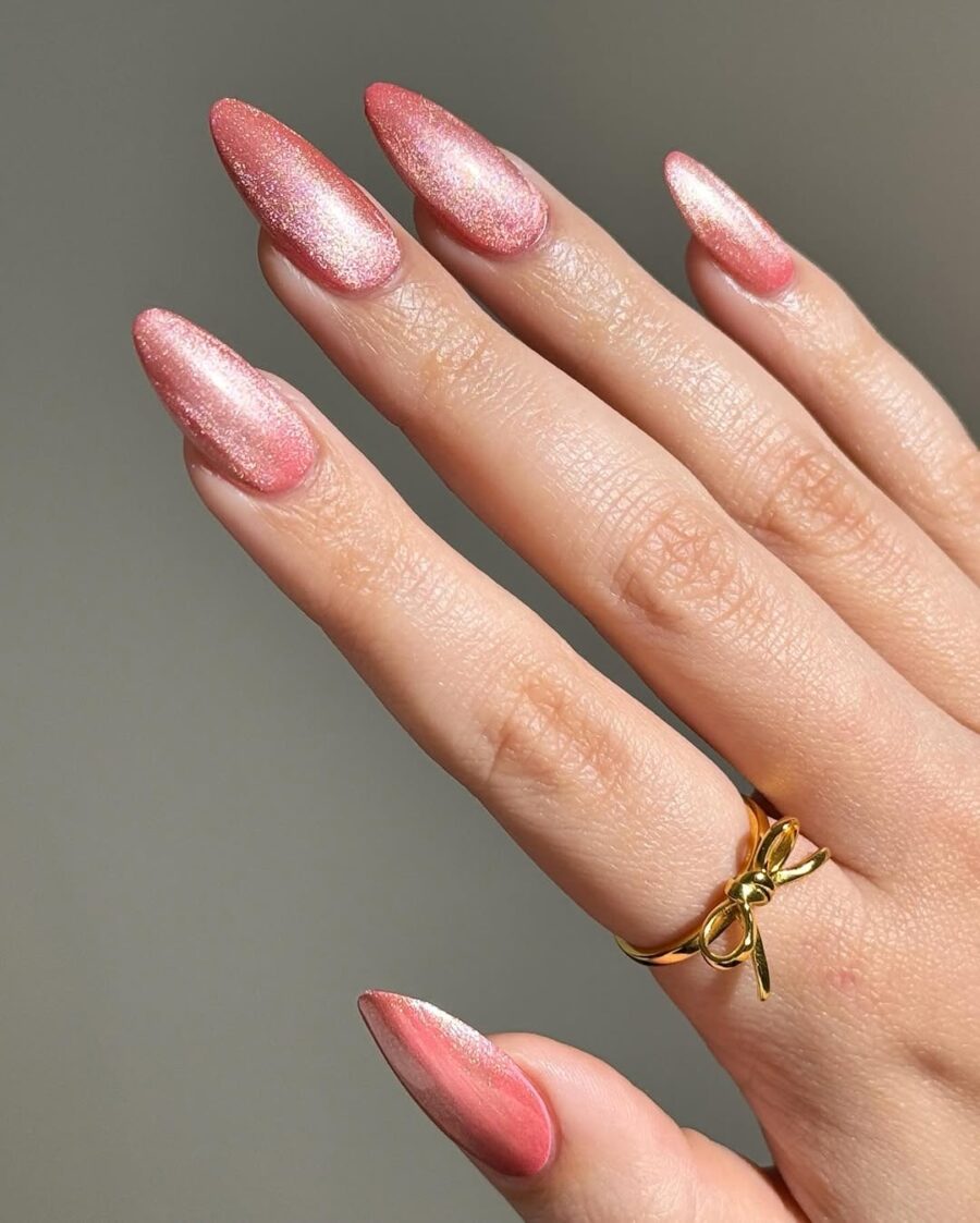 Stunning pink velvet nails with a shimmer finish