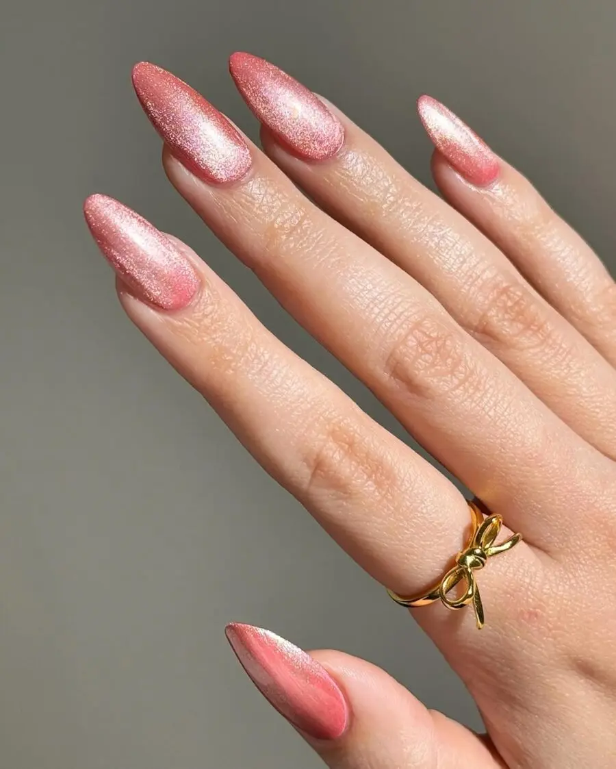 Stunning pink velvet nails with a shimmer finish
