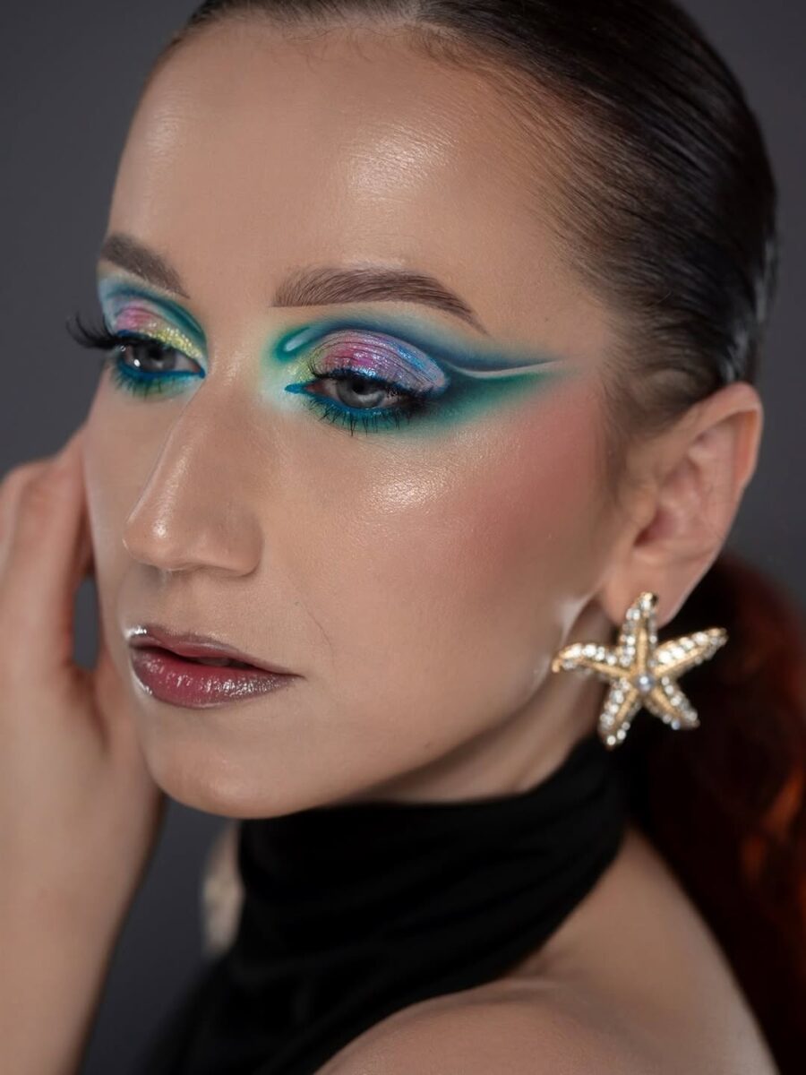 Bold summer makeup with vibrant colors and glimmer