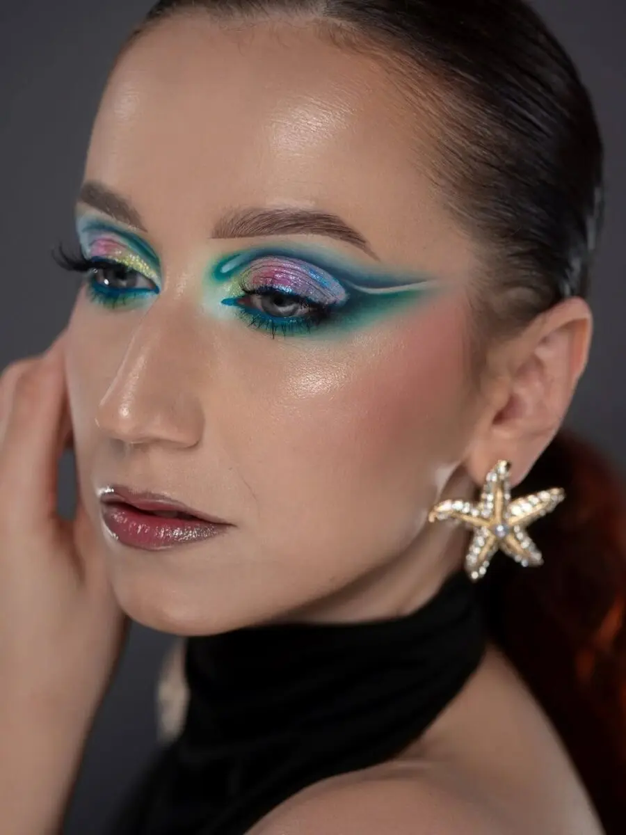 Bold summer makeup with vibrant colors and glimmer