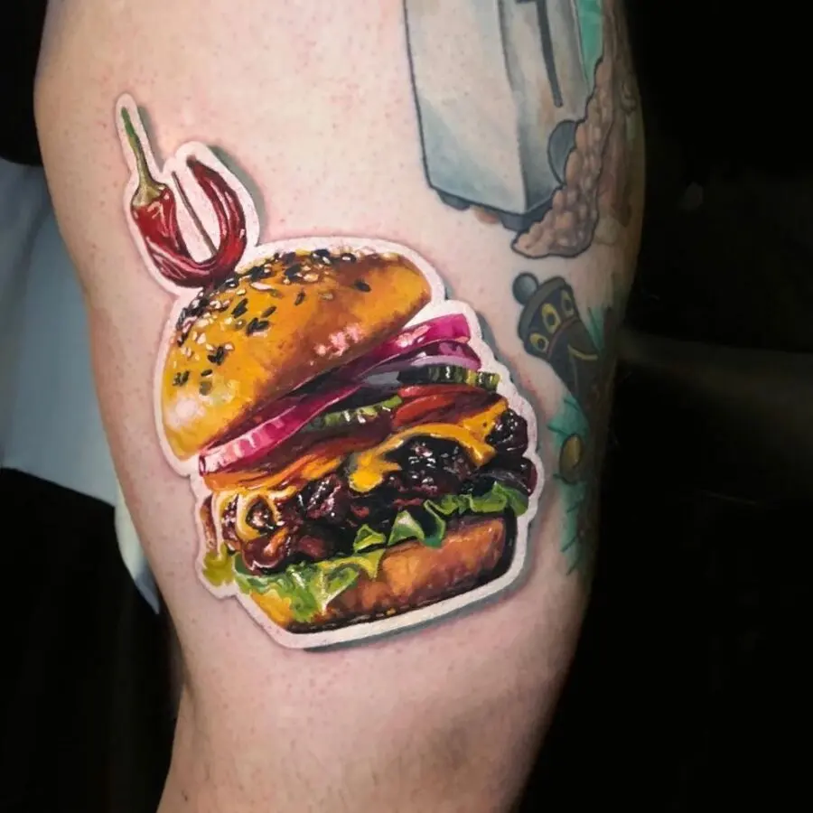 Deliciously vibrant burger tattoo on display