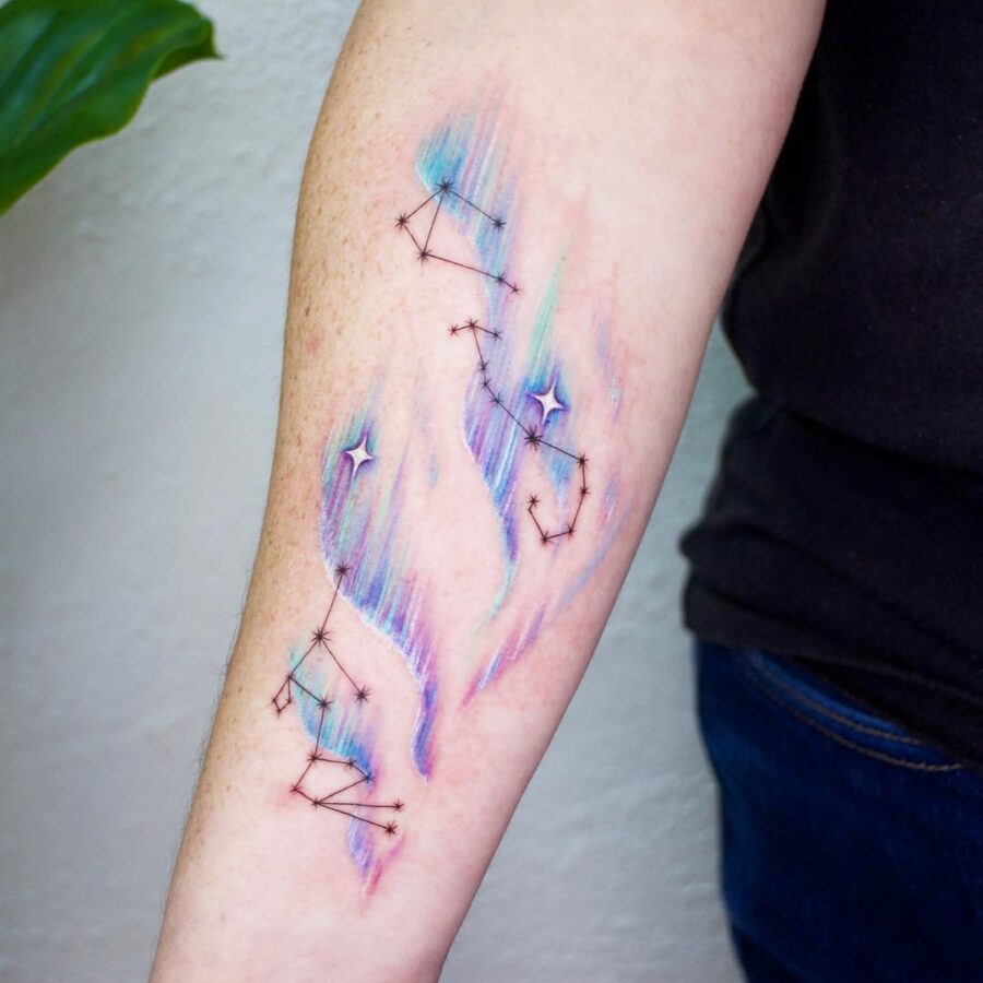 Colorful constellation tattoo with cosmic vibes