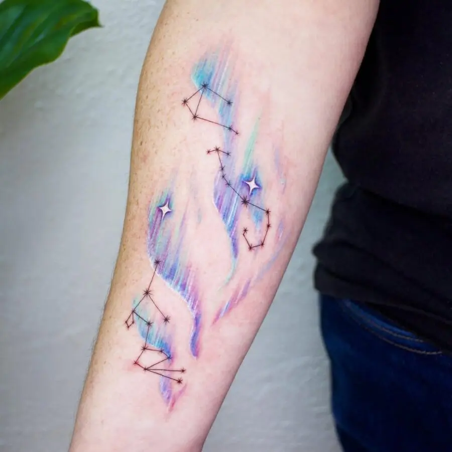 Colorful constellation tattoo with cosmic vibes