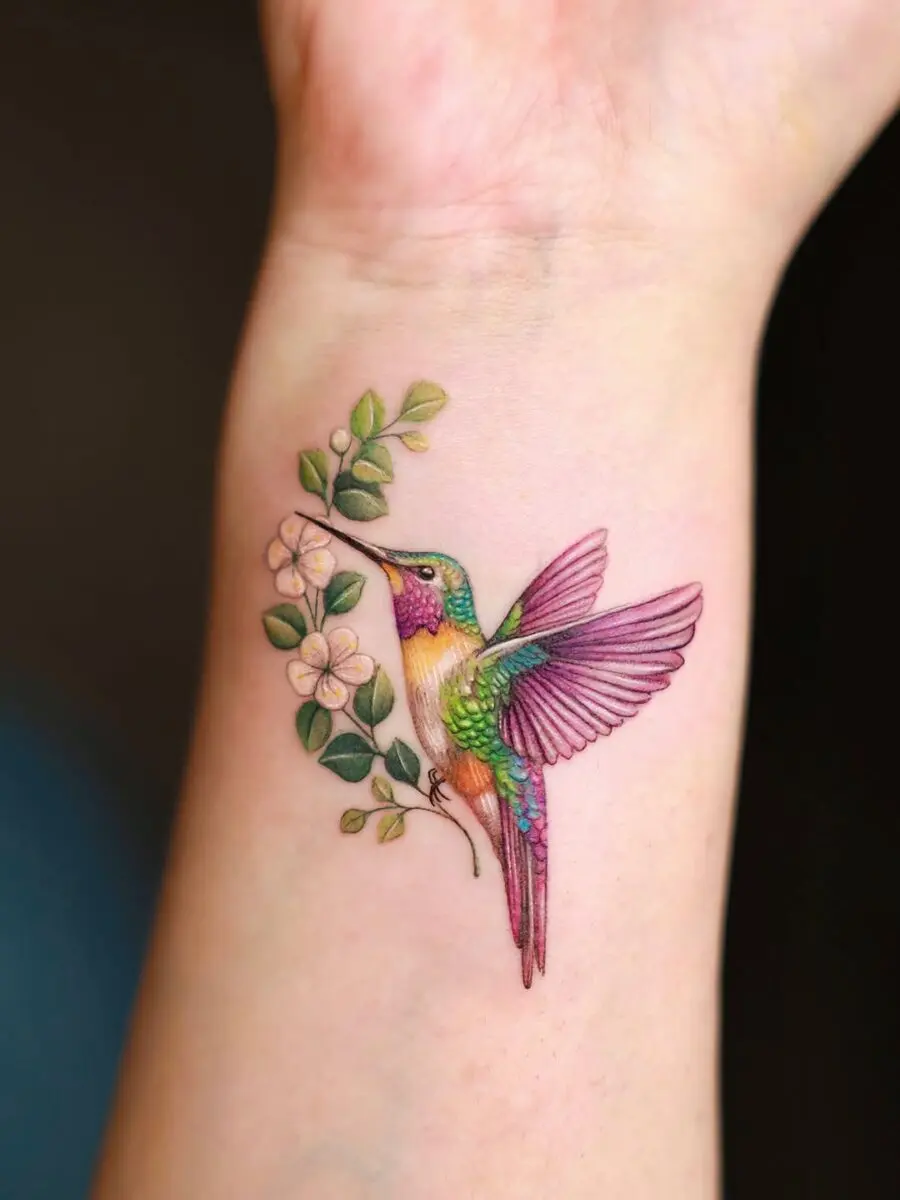 Vibrant Hummingbird Tattoo with Blossoms