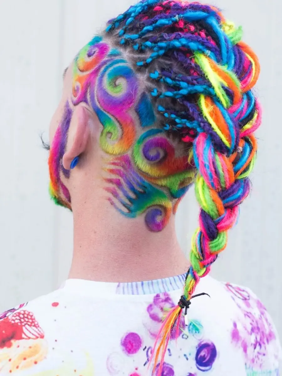 Vibrant locs with intricate undercut patterns