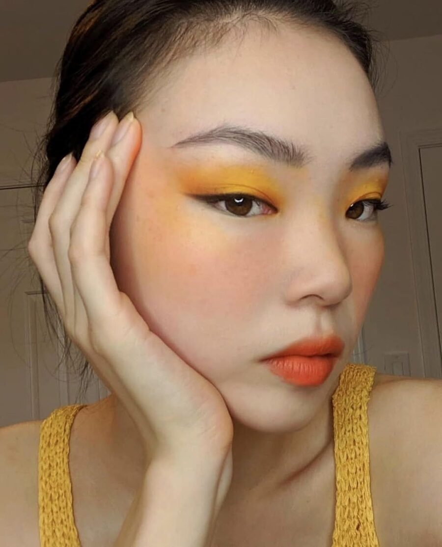Bright yellow makeup for a bold look