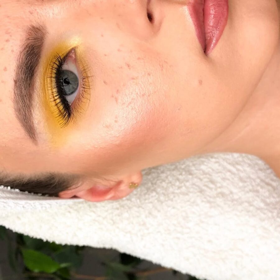 Vibrant yellow eyeshadow for a fresh look