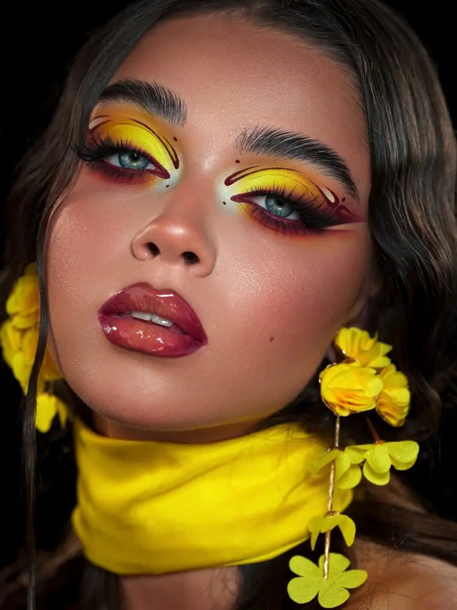 Bold and vibrant yellow makeup look