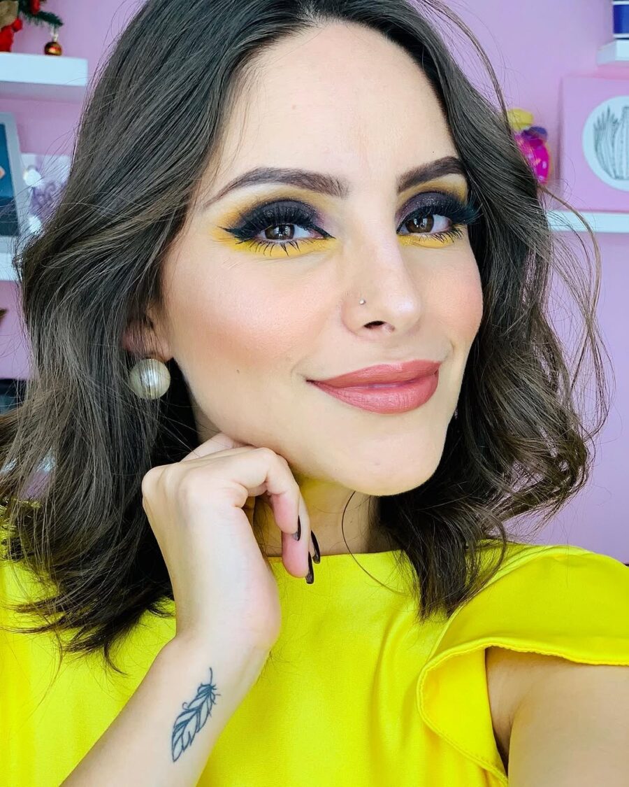 Bright yellow makeup for a bold statement