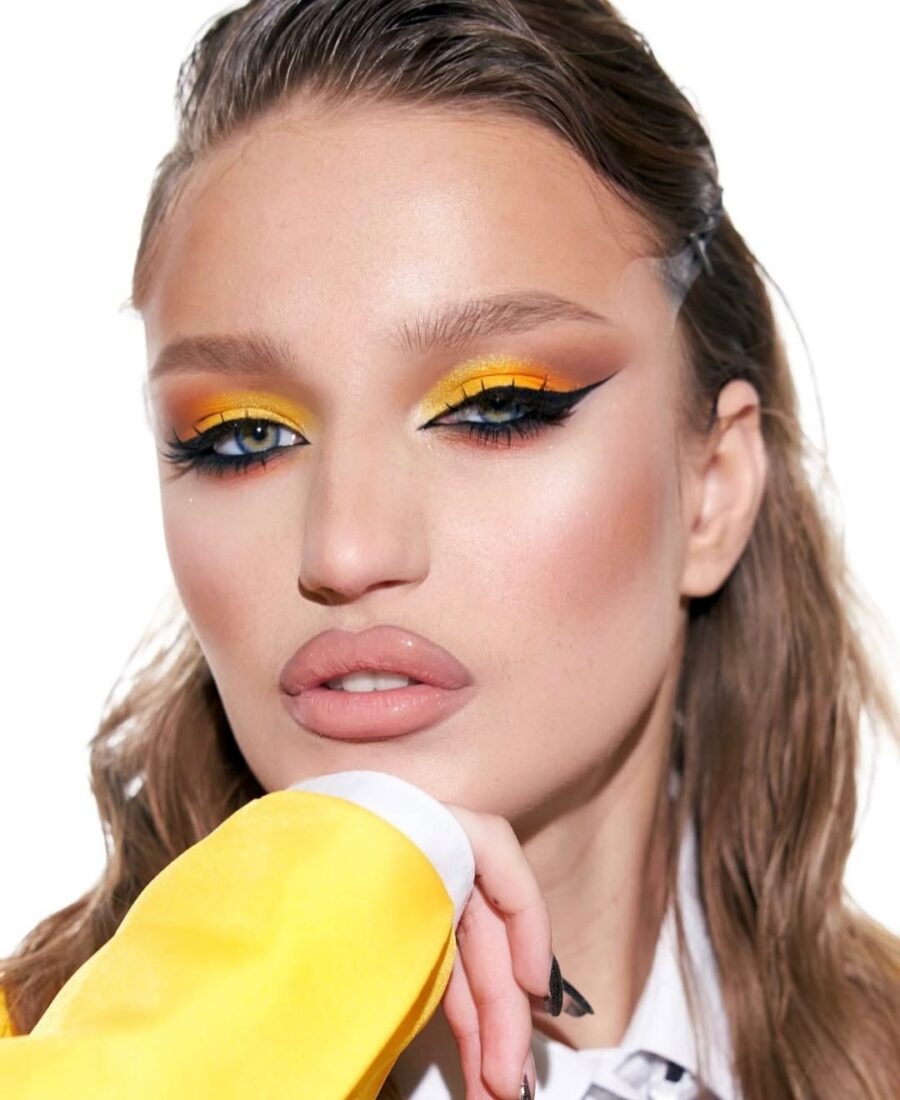Bold yellow makeup for a lively look