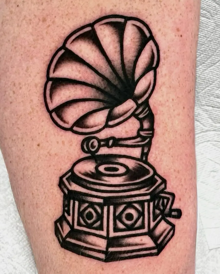 Classic gramophone tattoo with intricate details