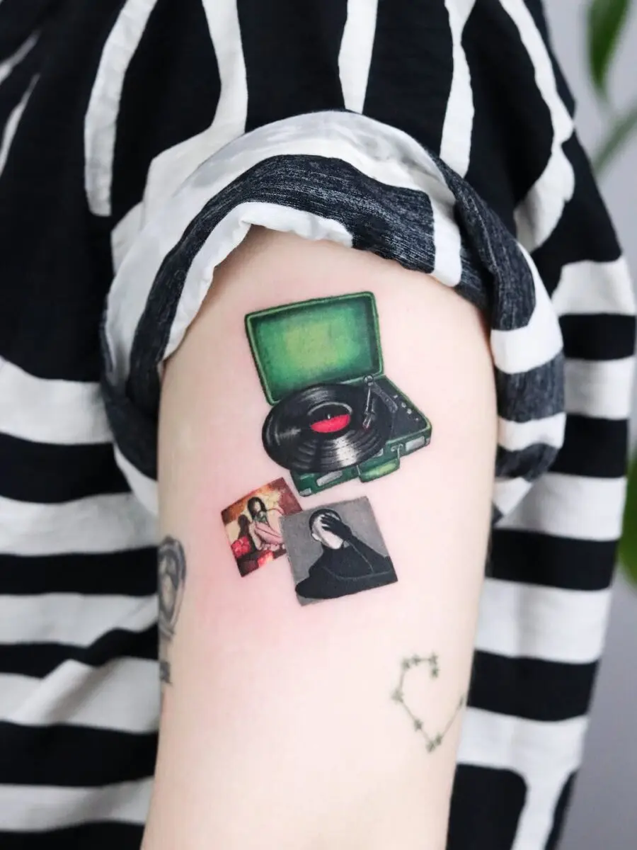Charming vintage record player tattoo design