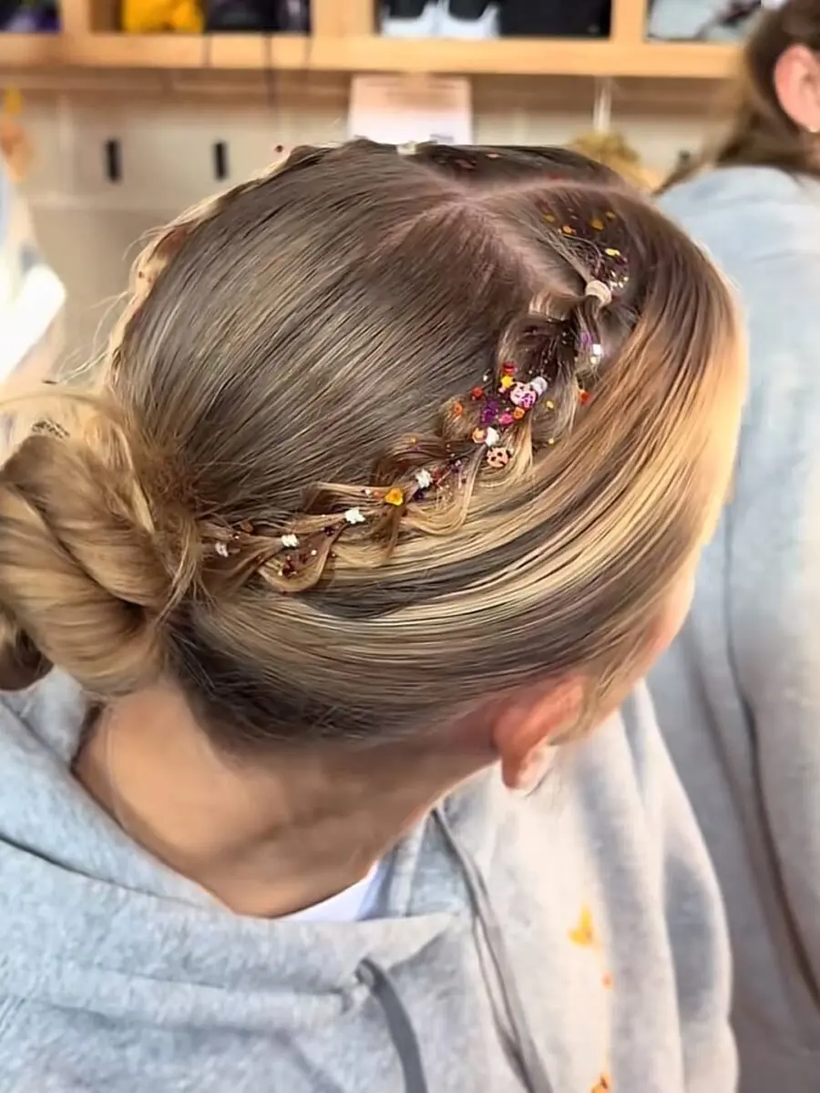 Chic braids adorned with colorful sparkles