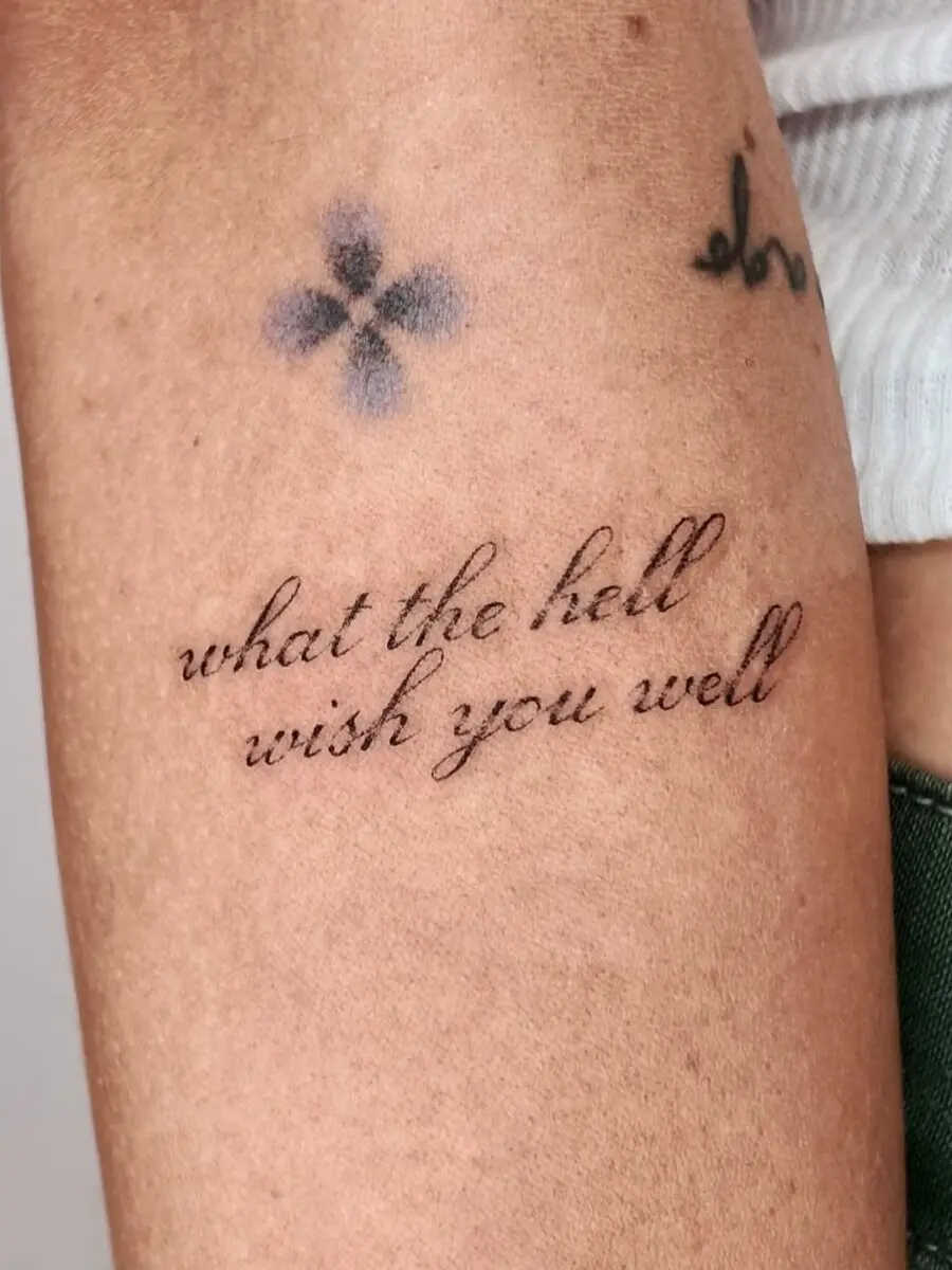 Stylish script tattoo with a personal touch