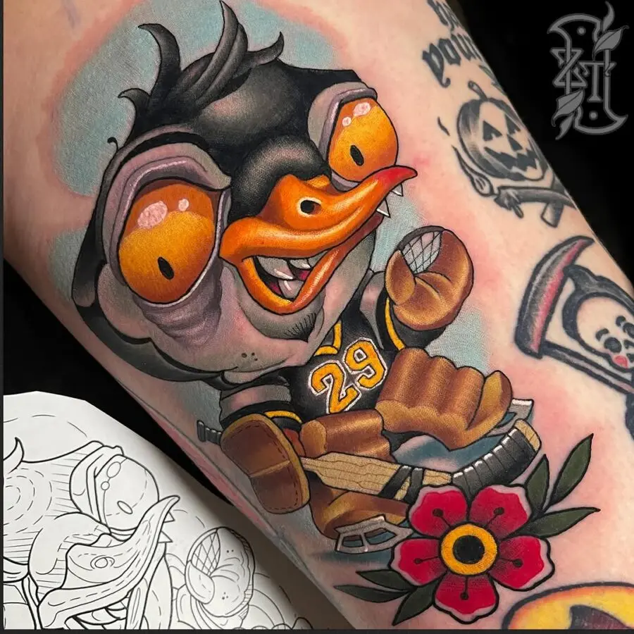 Vibrant cartoon tattoo with playful duck character