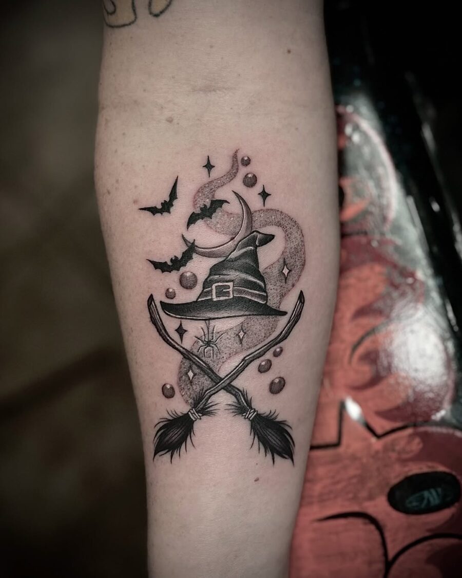 Charming witch hat tattoo with mystical elements