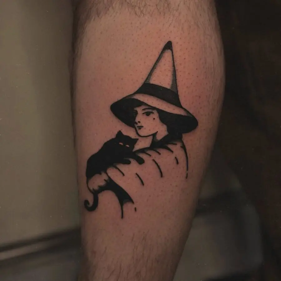Charming witch hat tattoo with cat companion
