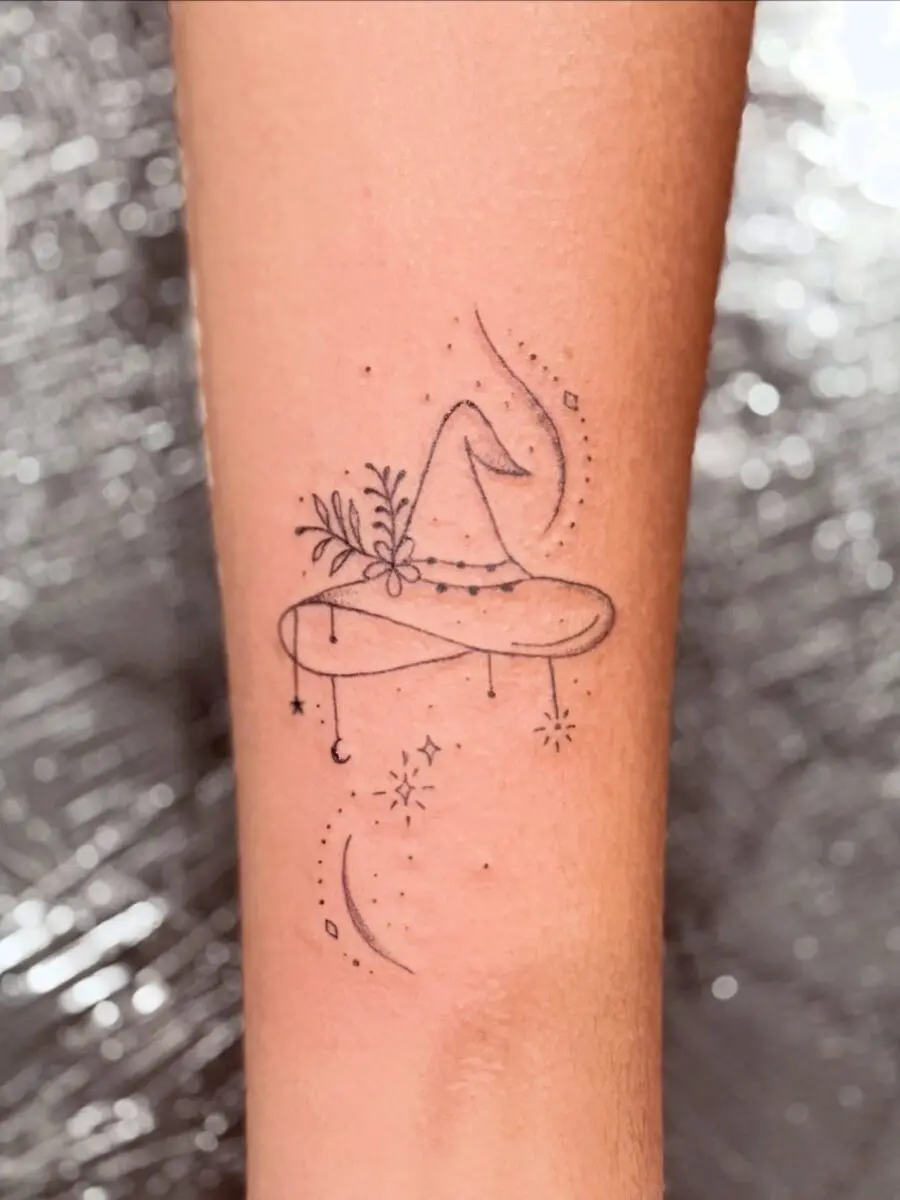 Whimsical witch hat adorned with nature and stars