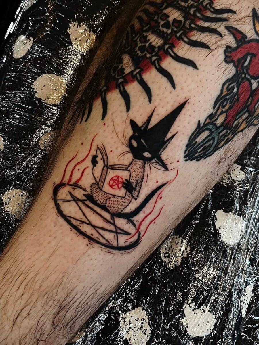 Intriguing witch hat tattoo with a mystical twist