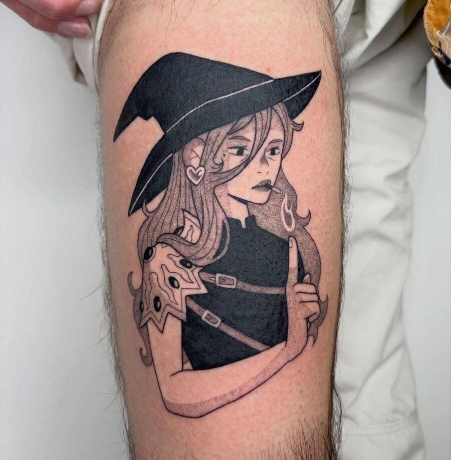 Stylish witch hat tattoo on a confident character