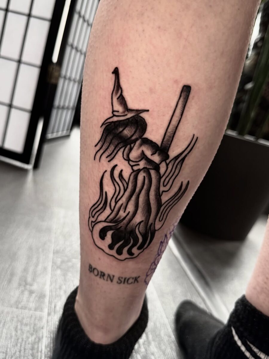 Witch hat tattoo with a mystical vibe