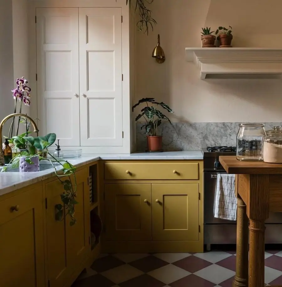 Charming yellow cabinets brighten up kitchen space