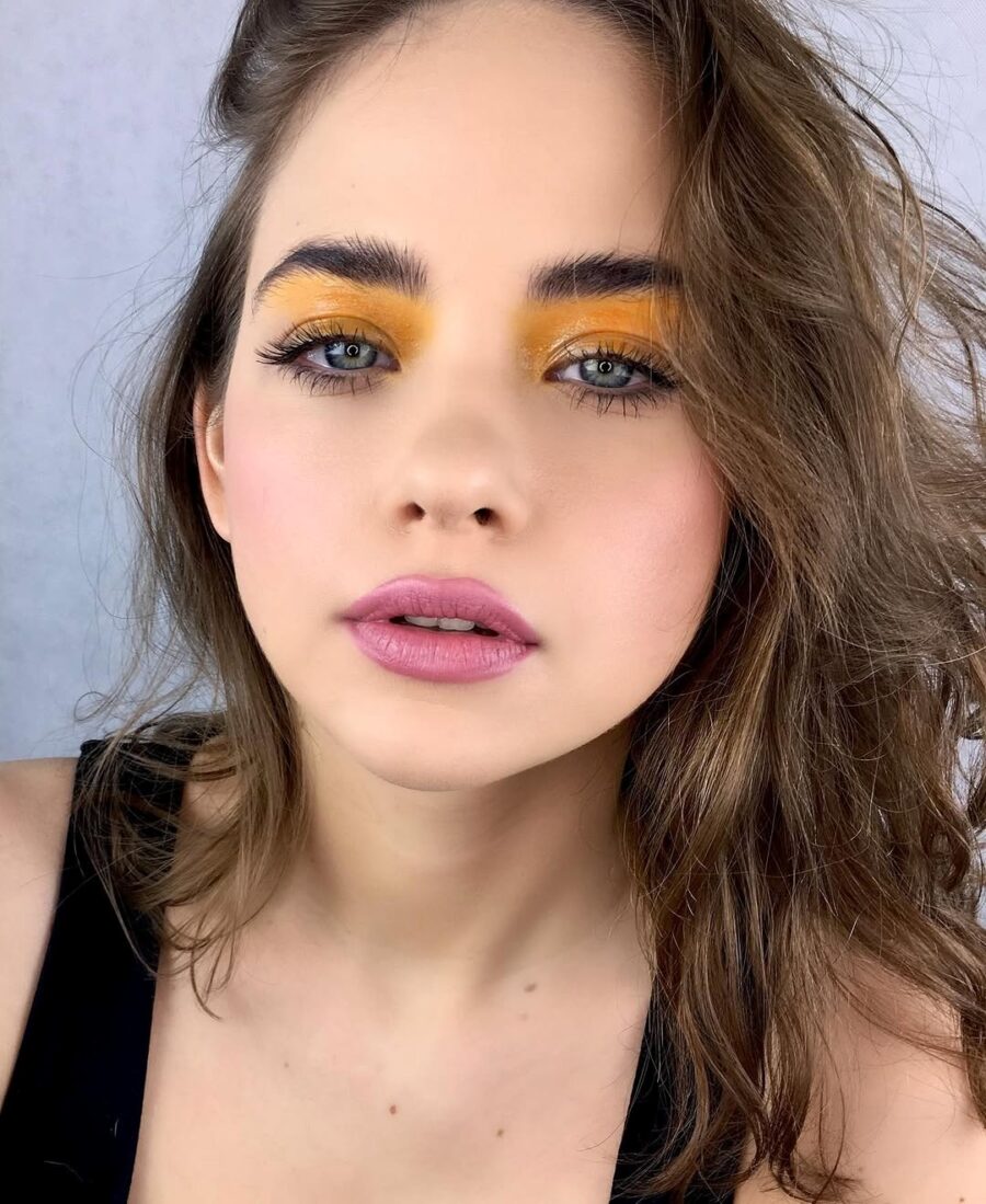 Striking Yellow Makeup Look for Bold Statements