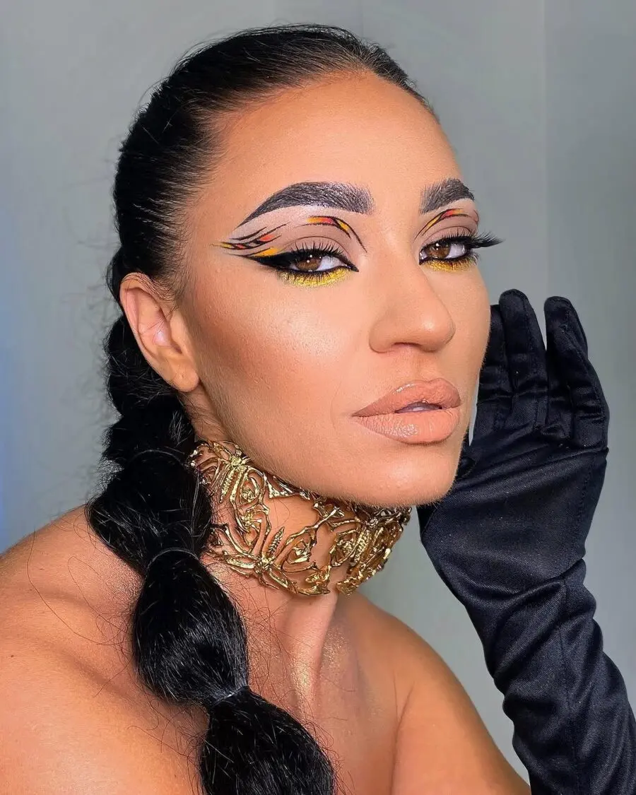 Striking yellow and black graphic eyeliner look