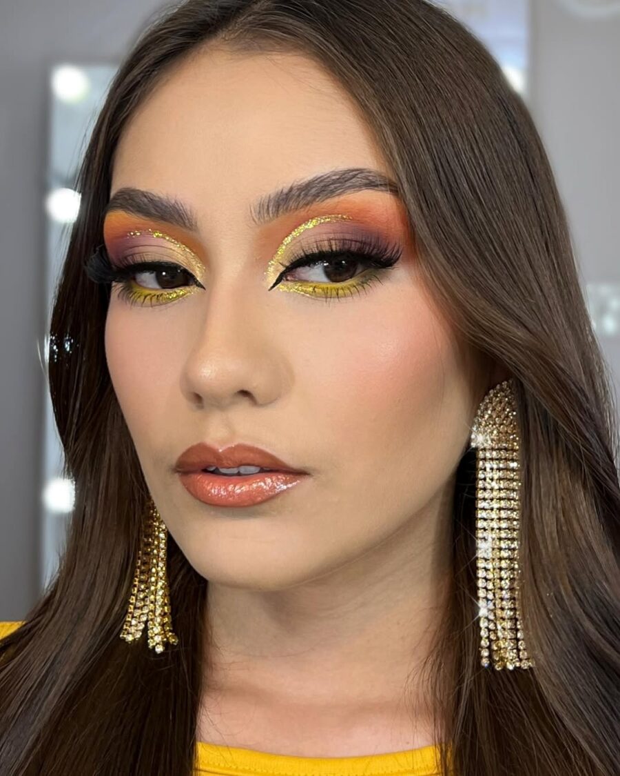 Vibrant yellow and orange makeup look