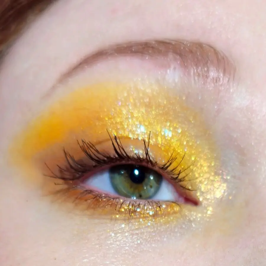 Vibrant yellow glitter for a bold look
