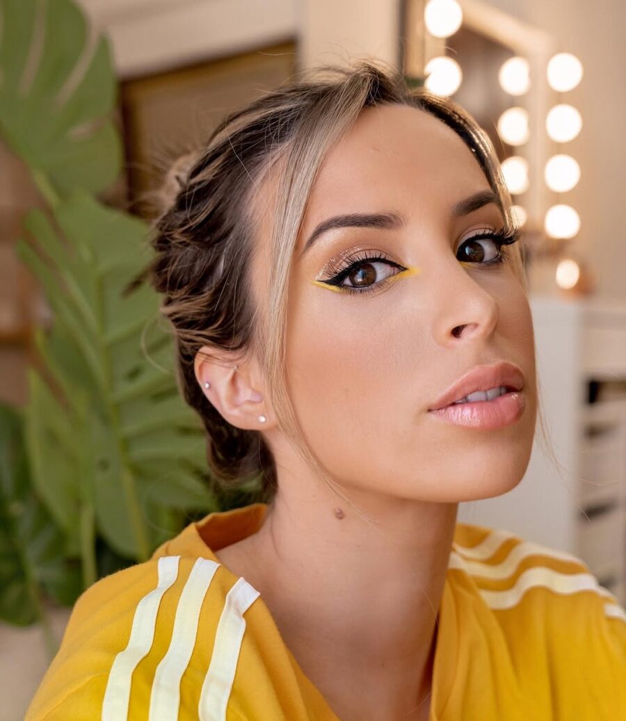 Vibrant yellow eyeliner for a bold look