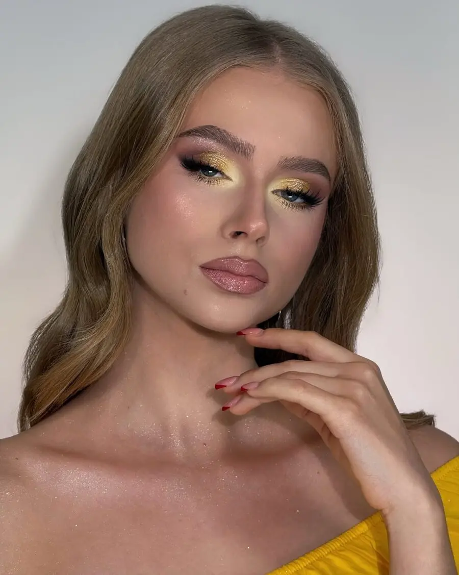 Bright, bold yellow makeup for a radiant look