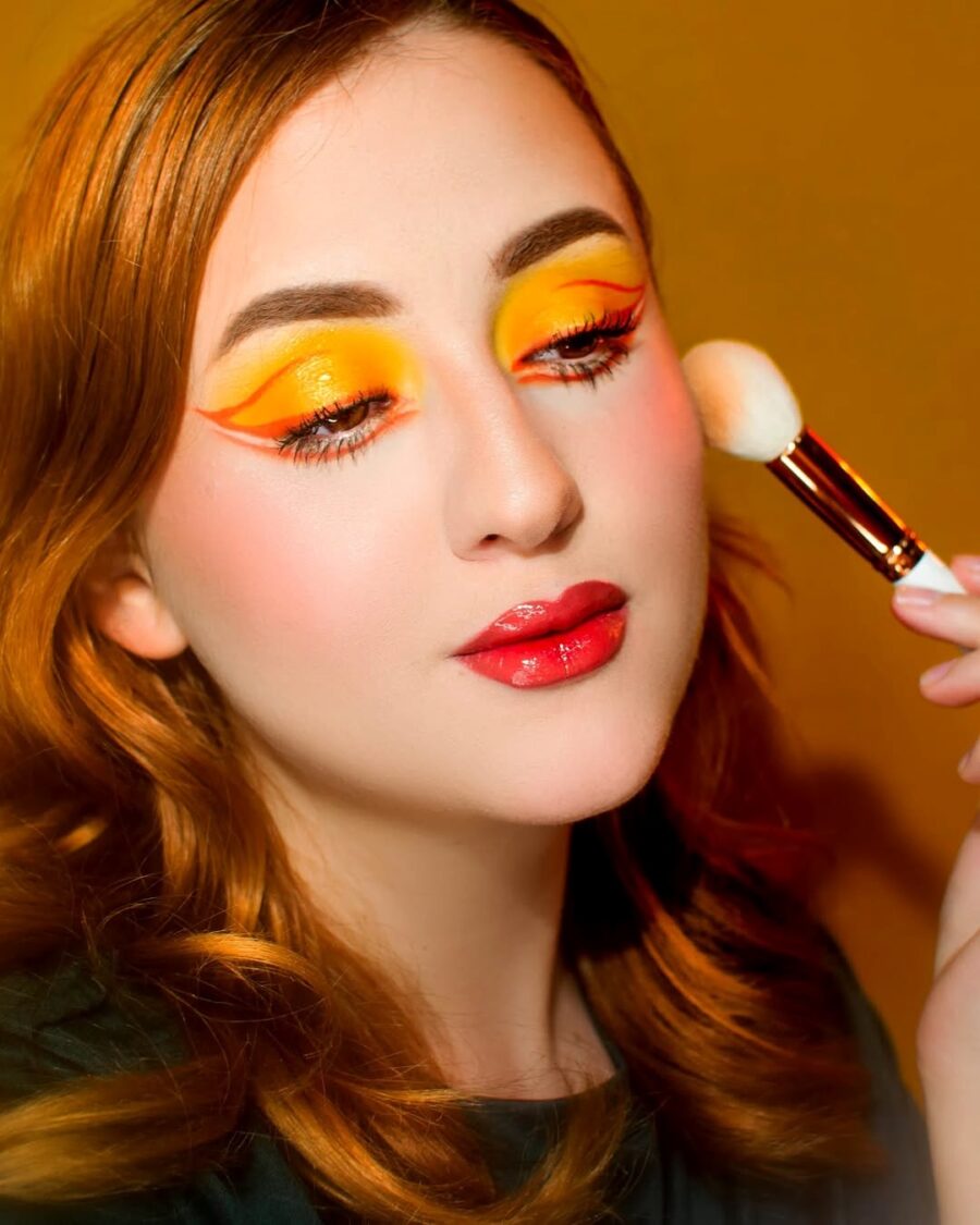 Vibrant yellow makeup for a radiant look