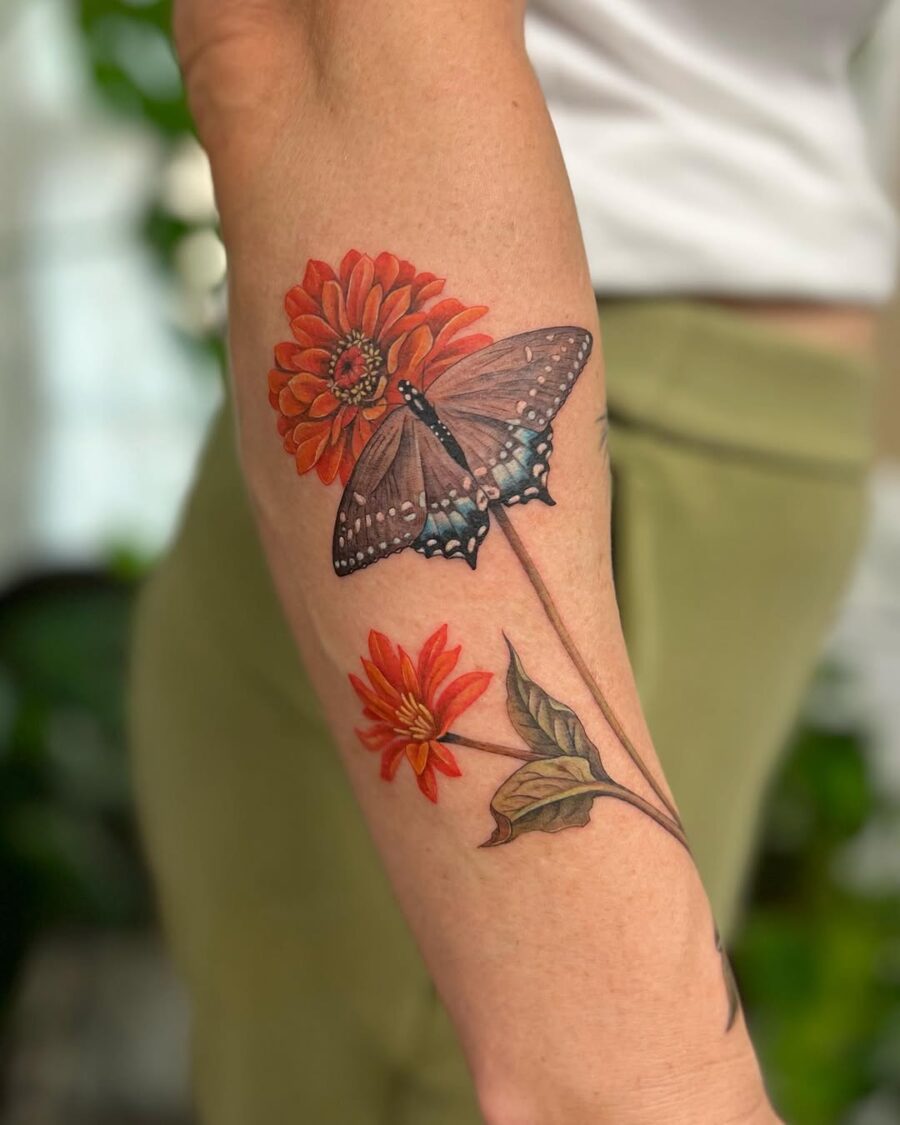 Colorful zinnia flower with butterfly tattoo