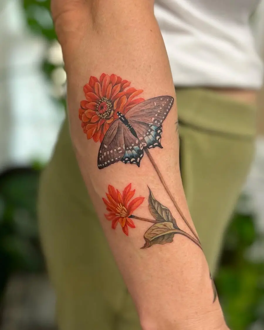 Colorful zinnia flower with butterfly tattoo