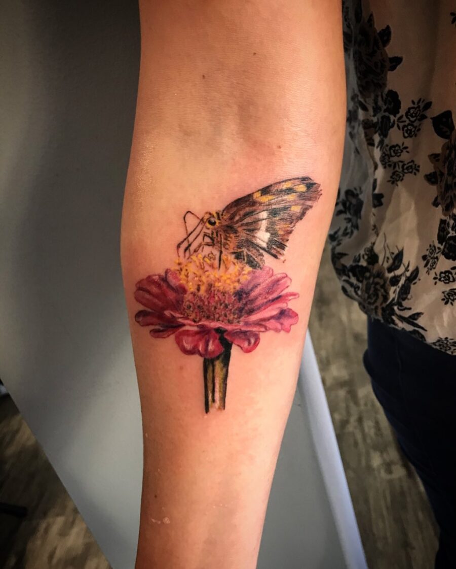 Vibrant Zinnia with a Butterfly Tattoo Design