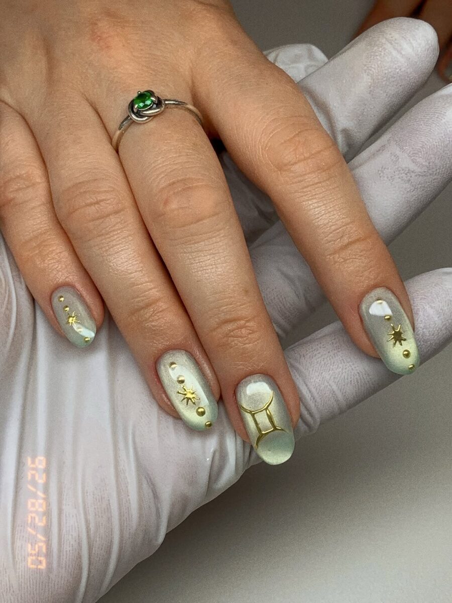 Elegant Gemini Themed Nail Art Design
