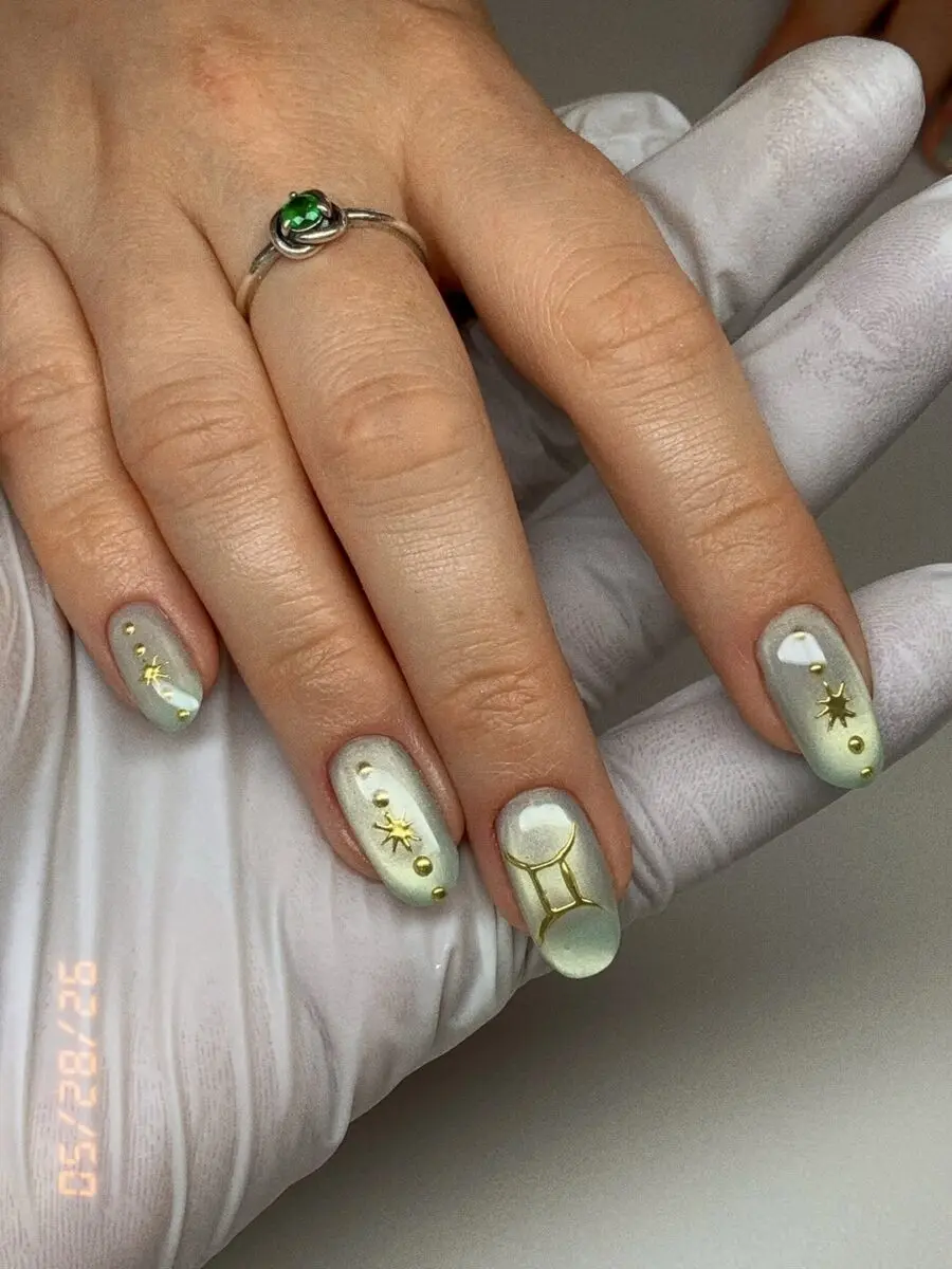 Elegant Gemini Themed Nail Art Design