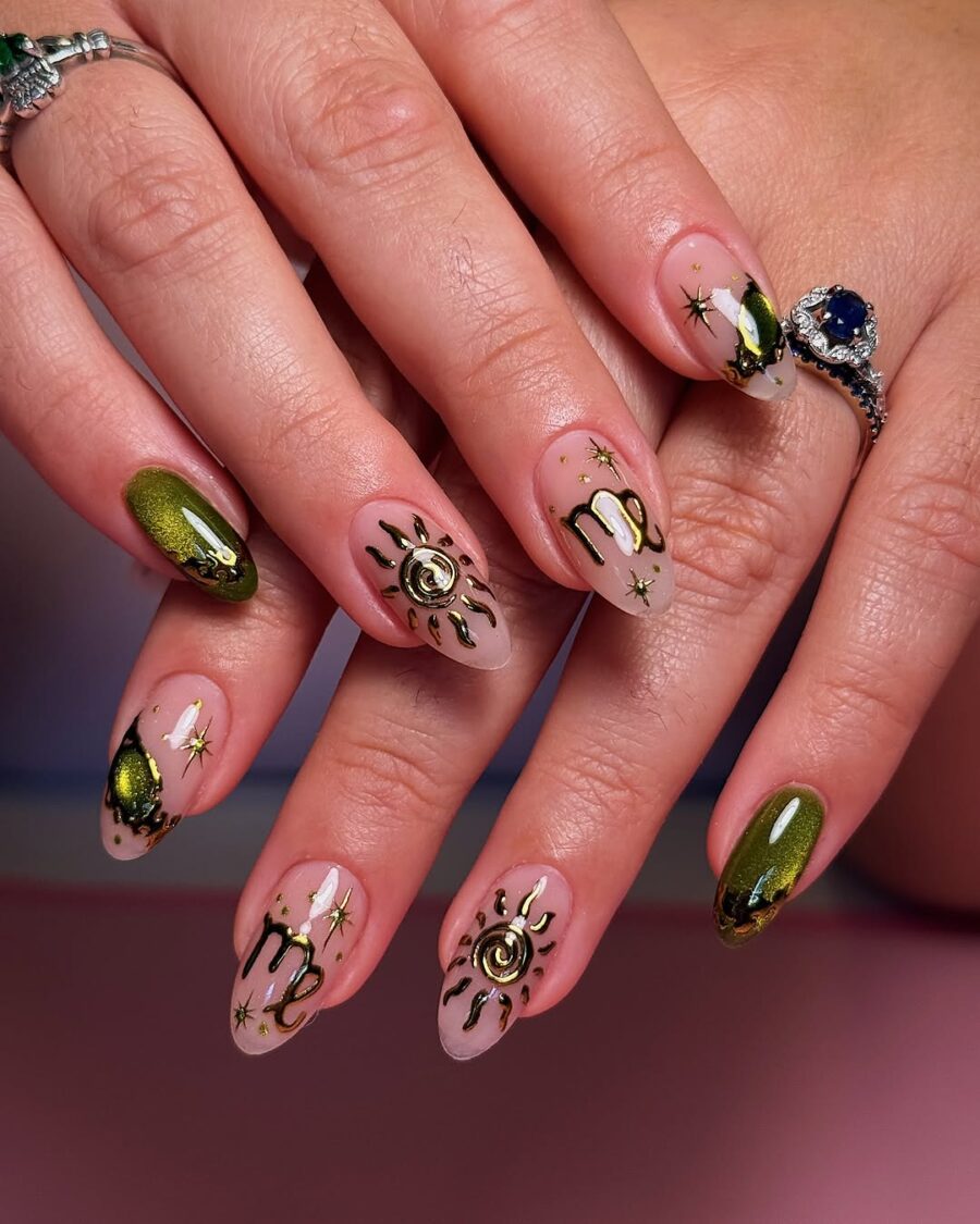 Shimmering zodiac nails with celestial designs