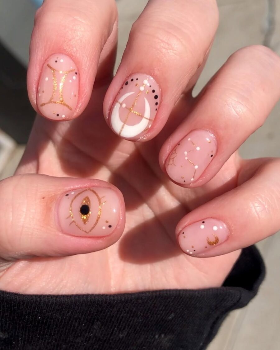 Chic zodiac nails with celestial accents