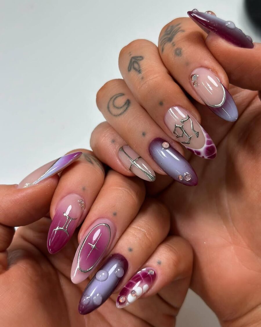 Astrological-themed purple ombre nail designs