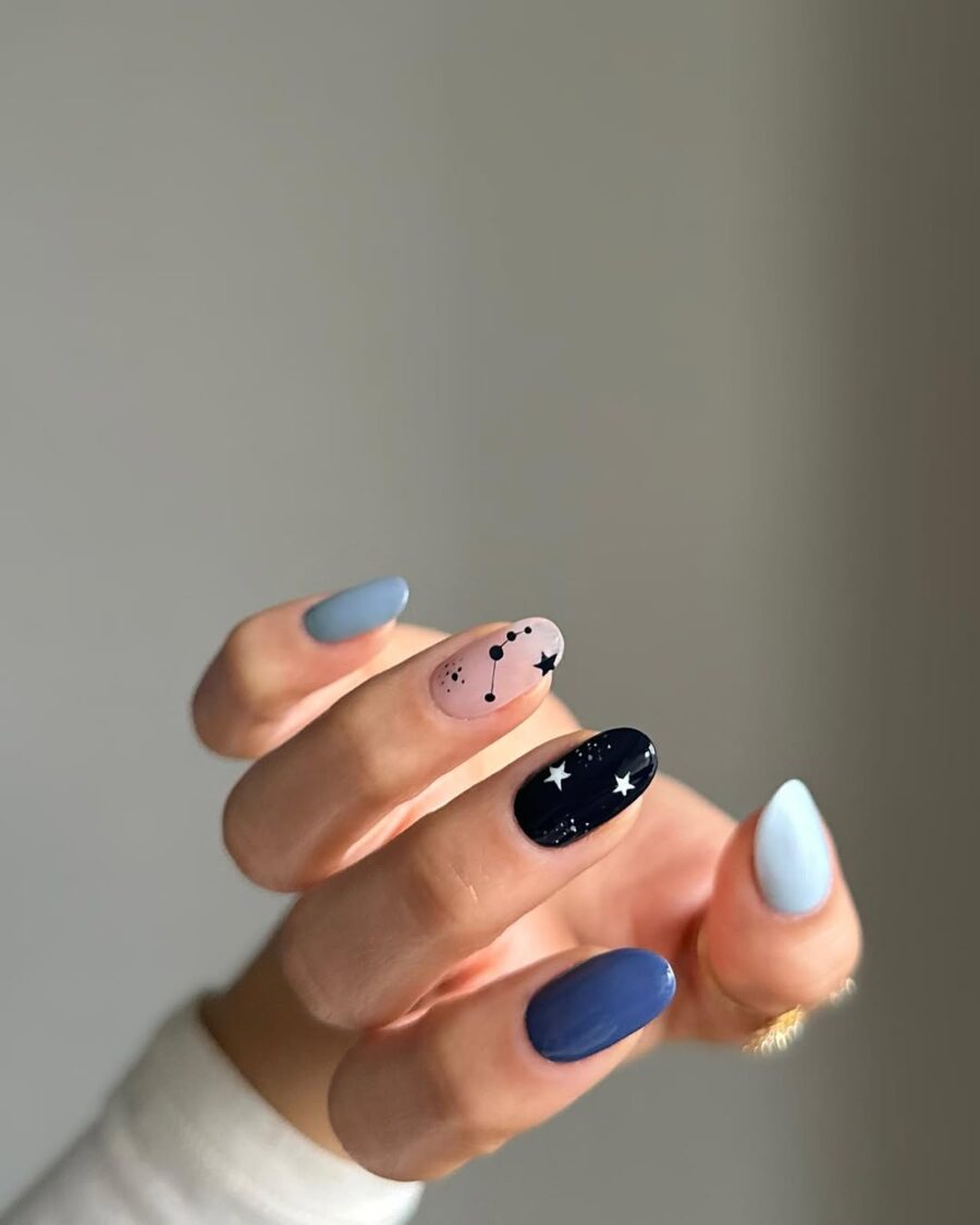 Celestial-inspired zodiac nail art collection.
