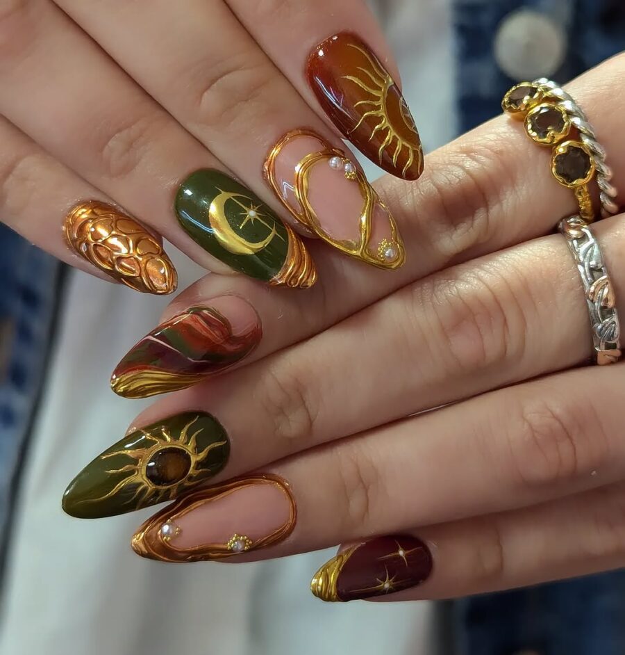 Astrological designs on chic elongated nails